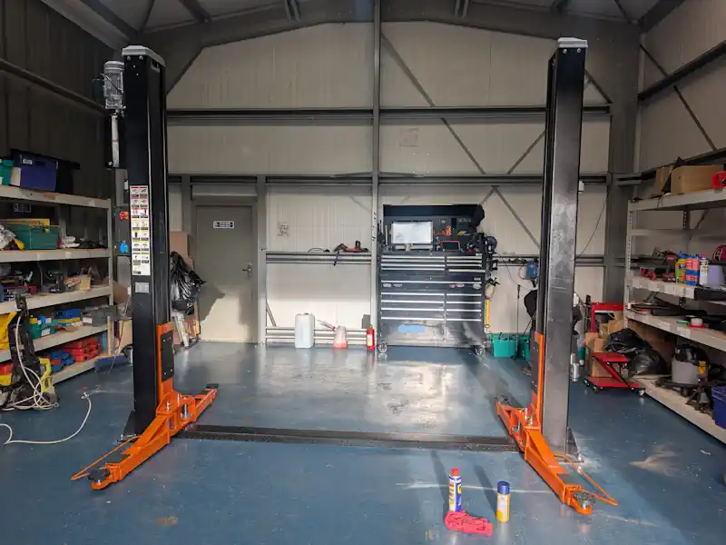 2 Post Lift install at C J Auto Service